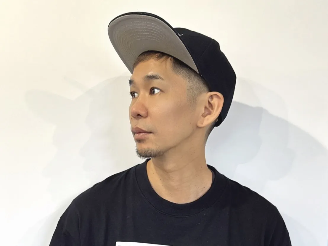 高越 康文